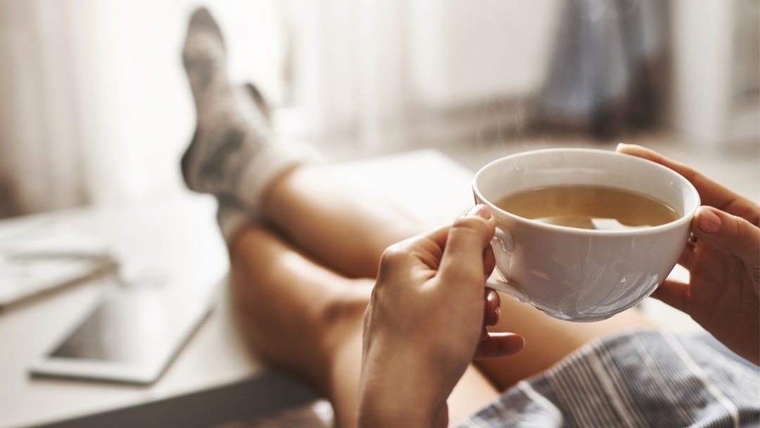 Teacher relaxing in the summer holidays with a tea